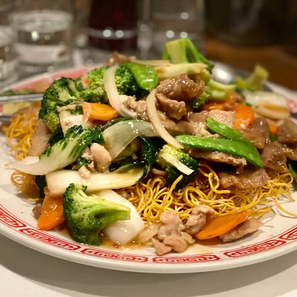 Lai Lai Restaurant's crispy chow mein with beef, broccoli, carrots, and snow peas.
